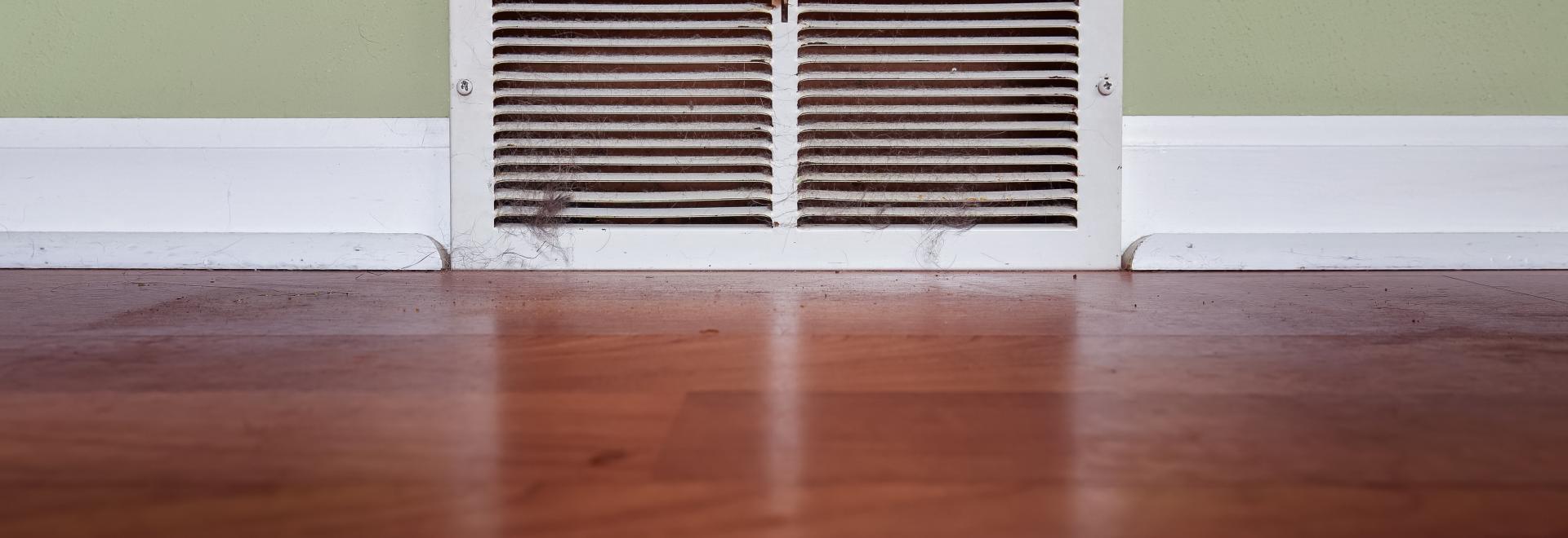 air vent near the floorboard of a home