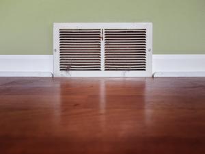 air vent near the floorboard of a home